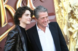 Timothee Chalamet (L) and Hugh Grant attend the Los Angeles premiere of Warner Bros.' 'Wonka' on December 11, 2023 