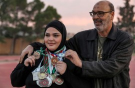 Salem al-Sayeh coaches and mentors his daughter