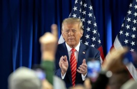 Former US president Donald Trump speaks at a "Commit to Caucus" rally in Newton, Iowa, on January 6, 2024