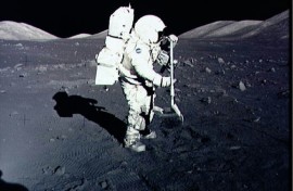 Astronaut Harrison Schmitt collects lunar rake samples at the Taurus-Littrow landing site on the moon during the Apollo 17 mission, America's last lunar landing