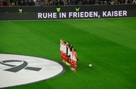 Bayern Munich's players observe a moment of silence in honour of late German football legend Franz Beckenbauer before their home clash with Hoffenheim on Friday