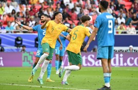 Jordan Bos celebrates after scoring Australia's second against India