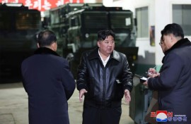 North Korean leader Kim Jong Un (C) has toured numerous weapons manufacturing facilities in recent months