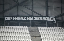 A banner pays tribute to late German football legend Franz Beckenbauer. He will be farewelled at a ceremony in Munich on Friday