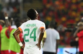 Ivory Coast forward Simon Adingra appears dejected at the end of his team's humiliating 4-0 loss to Equatorial Guinea on Monday