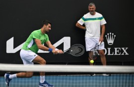 Novak Djokovic attends a training session ahead of his Australian Open semi-final