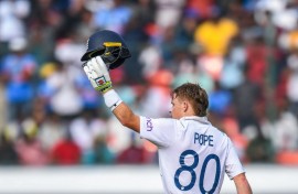 England's Ollie Pope celebrates after scoring a century 
