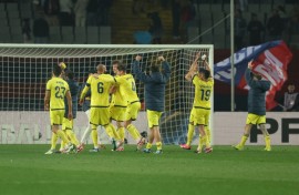 Villarreal's players celebrate their thrilling 5-3 victory over Barcelona in La Liga on Saturday at the Olympic Stadium