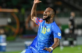Meschack Elia celebrates scoring for DR Congo against Egypt. 