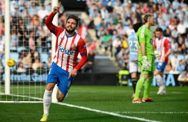 Girona forward Portu celebrates after scoring his team's winning goal at Celta Vigo which sent the Catalans top again