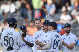Tom Hartley (C) claimed seven wickets in India's second innings to help England to victory in the first Test in Hyderabad
