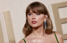 Taylor Swift, shown here arriving at the 2024 Golden Globes, is poised to make Grammy history as she vies for top prizes including Album of the Year