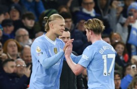 Erling Haaland (left) is ready to start after a two-month injury layoff, says Pep Guardiola