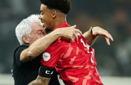 South Africa coach Hugo Broos embraces Ronwen Williams after the goalkeeper's heroics against Cape Verde took them through to the Africa Cup of Nations semi-finals