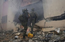 The United States and Britain said they launched strikes against dozens of targets in Yemen in response to attacks on shipping by Iran-backed Huthi rebels