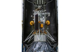 This handout picture from NASA shows the Nova-C lunar lander encapsulated within the fairing of a SpaceX Falcon 9 rocket in preparation for launch