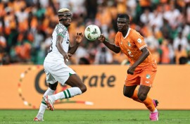 Victor Osimhen (L) in action for Nigeria against hosts Ivory Coast during the group stage