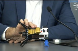 This frame grab from Nasa, shows Intuitive Machines CEO Steve Altemus holding a model of Odysseus to show its position on the side 