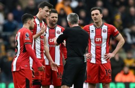 Jack Robinson (right) squared up to teammate Vinicius Souza (not pictured) during Sheffield United's 1-0 defeat at Wolves