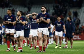 Charles Ollivon (C) after the draw to Italy