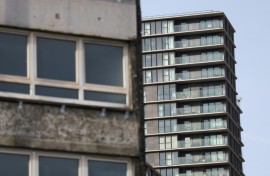 A crumbling housing estate in Stratford next to the gleaming luxury apartments of Olympic Park