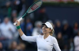 Britain's Katie Boulter waves to fans after beating American Emma Navarro to reach the final of the WTA touranment in San Diego, California