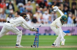 Australia's Usman Khawaja is stumped by New Zealand wicketkeeper Tom Blundell during day three of the first Test