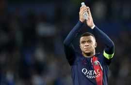 Kylian Mbappe insisted he had 'no problem' with coach Luis Enrique after firing PSG into the Champions League quarter-finals