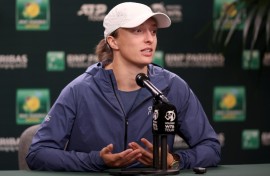 World number one Iga Swiatek of Poland fields questions from the media before the Indian Wells WTA-ATP Masters