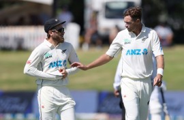 New Zealand batsman Kane Williamson (L) and seamer Tim Southee (R) are due to play their 100th Test on Friday against Australia in Christchurch