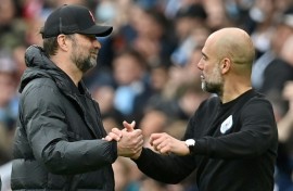 Jurgen Klopp (left) is preparing to pit his wits against Pep Guardiola 