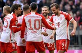 Hat-trick star: Bayern Munich's Harry Kane celebrates 