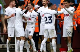 Tottenham celebrate during their victory at Aston Villa