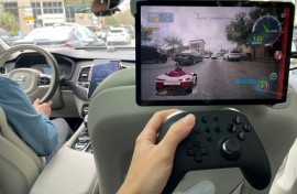 A journalist tests Valeo Racer, an extended reality video game, at the gigantic SXSW festival in Austin, Texas, on March 12, 2024