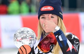 Thumbs up: Mikaela Shiffrin with her slalom globe after taking her World Cup tally to 97 