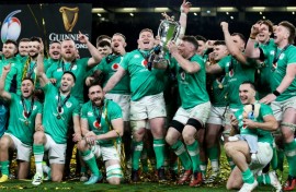 Champions: Ireland captain Peter O'Mahony lifts the Six Nations trophy after a 17-13 win over Scotland in Dublin