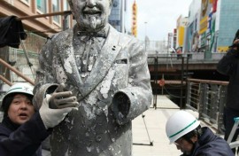 A statue of Colonel Sanders after it was recovered from the sludge of a river in Osaka, Japan on March 11, 2009