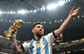 Adidas icon: Lionel Messi celebrates after leading Argentina to victory over Nike's France  in the 2022 World Cup final