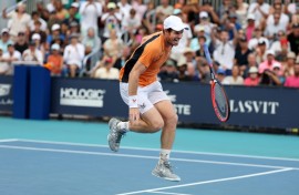 Andy Murray of Great Britain screams in pain after hurting his left ankle during his match against Tomas Machac of the Czech Republic on Day 9 of the Miami Open at Hard Rock Stadium on Sunday.