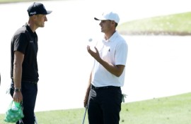 Poland's Adrian Meronk speaks with ninth-ranked Ludvig Aberg of Sweden during pracrice for the 88th Masters