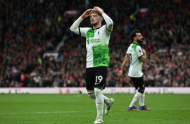 Liverpool's title hopes were dented by a draw at Manchester United