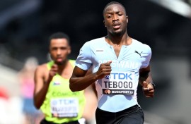 Letsile Tebogo leads a 200 metres heat during the 2023 world championships in Budapest.