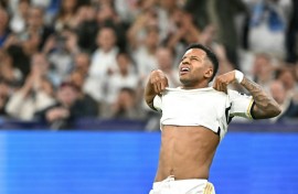 Real Madrid's Brazilian forward Rodrygo celebrates scoring against Man City in the first leg