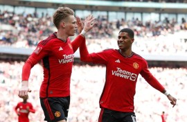 Scott McTominay (left) celebrates his goal for Manchester United against Coventry in the FA Cup semi-final at Wembley