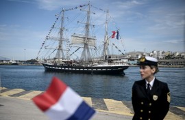 The Olympic torch begins its sea journey to France on the Belem from Piraeus