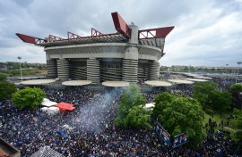 Inter Milan supporters celebrate their team's Serie A title outside the San Siro 