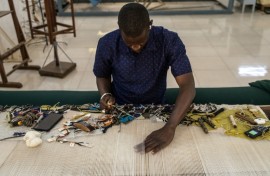Senegalese tapestries adorn the walls of organisations the world over