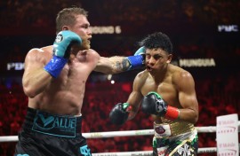 Saul 'Canelo' Alvarez lands a left against Jaime Munguia on the way to a unanimous decision victory in their super-middleweight world title fight in Las Vegas