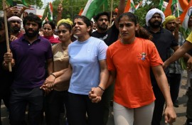 Bajrang Punia (left) joined wrestlers Vinesh Phogat, Sakshi Malik and Sangeeta Phogat on a protest march against the federation chief a year ago