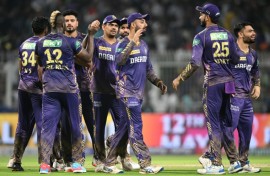 Kolkata Knight Riders became the first team to book their play-off spot in the IPL with victory over Mumbai Indians